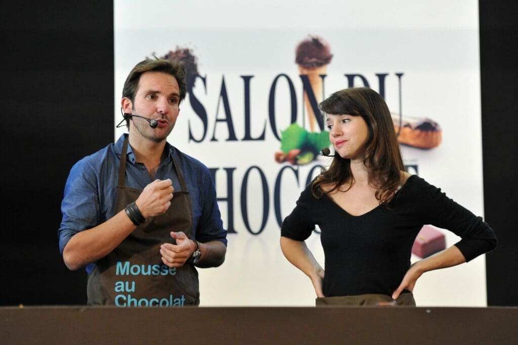 Christophe Michalak et Delphine Mc Carty ®julienmillet Christophe Michalak et Delphine McCarty au Salon du Chocolat.