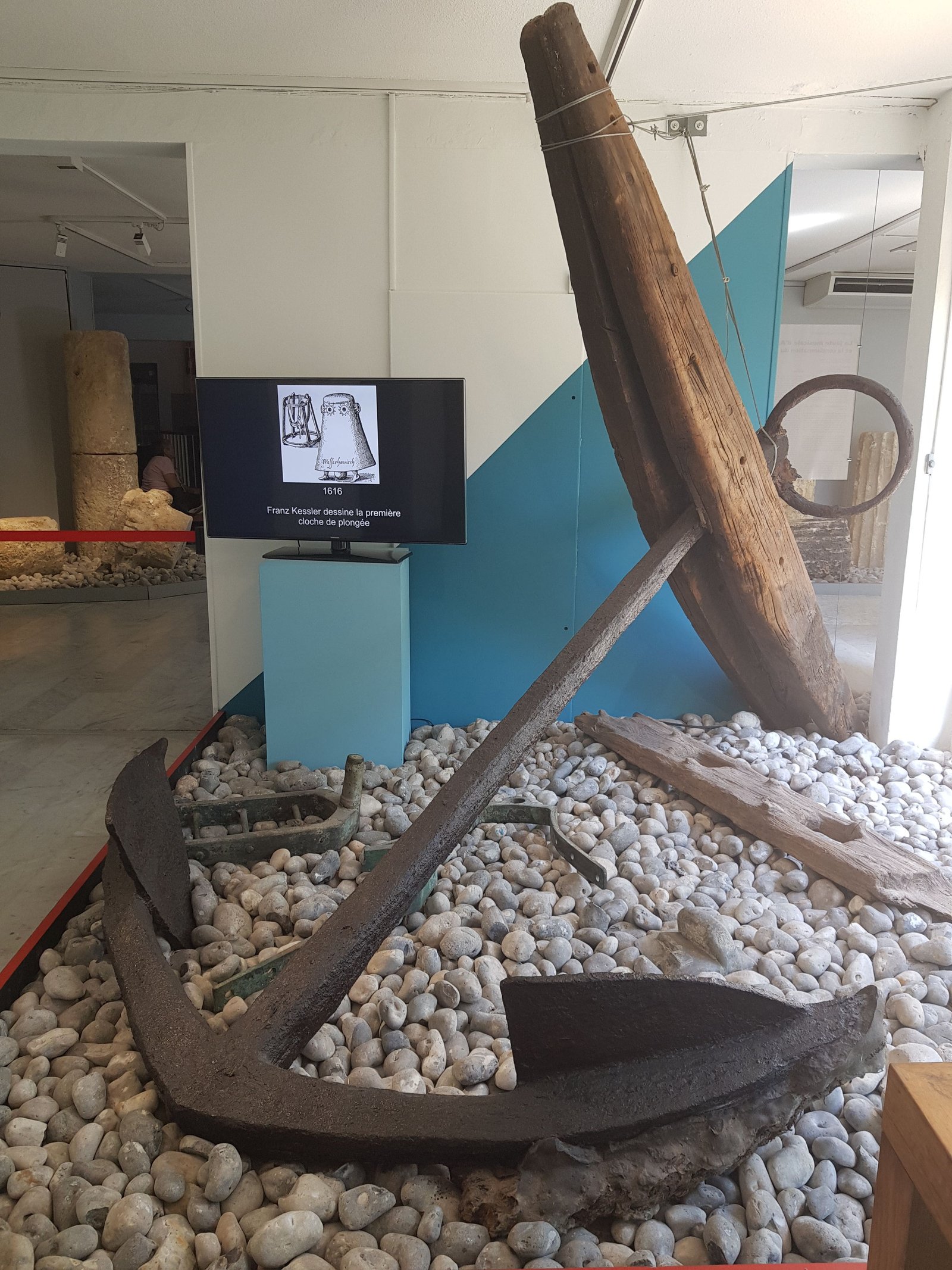 Roman anchors and a model boat at the Museum of the Ephebe Cap d'Agde.