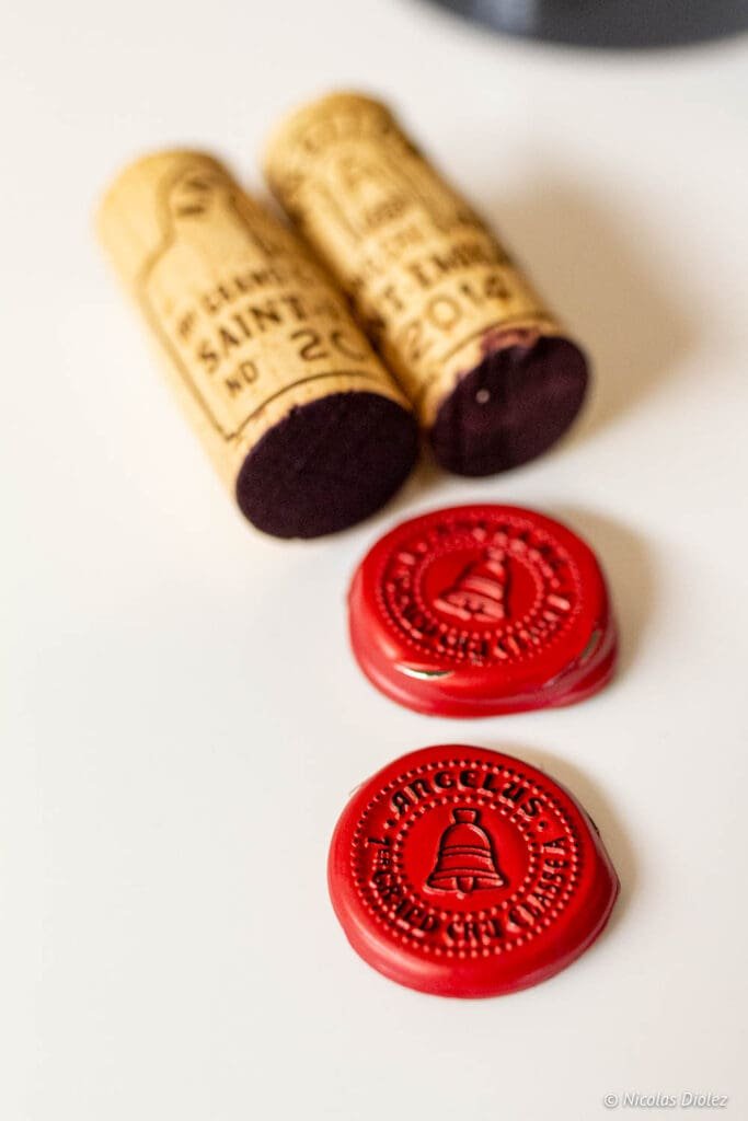 Red wax corks and capsules vintage Château Angélus Saint-Émilion.