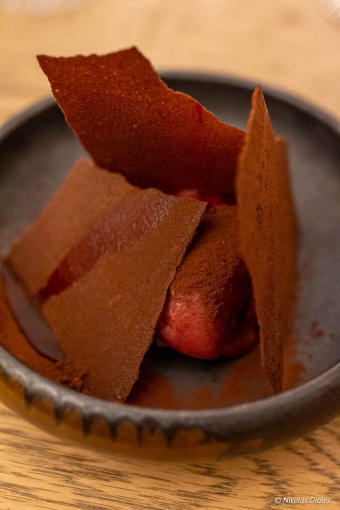 Chocolate pre-dessert with crunchy tuiles from the Logis de la Cadène.